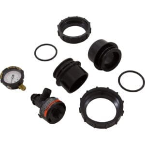 Pressure gauge and fittings disassembled on white.