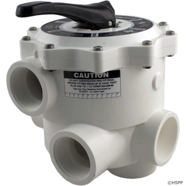 Pool multiport valve with caution label.