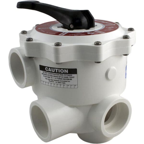 White multi-port valve with black handle.