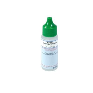Green-capped bottle of thiosulfate solution.