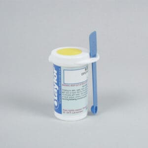 Pool water test kit with blue spoon.