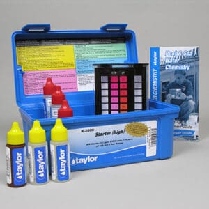Pool water testing kit with bottles and booklet.