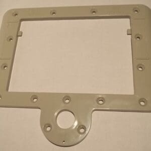Gray plastic mounting bracket with multiple holes.