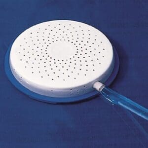 Circular shower head on blue background.