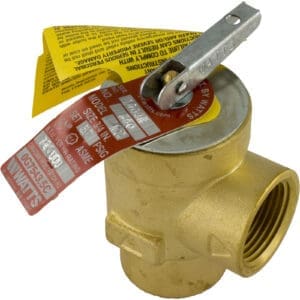 Brass safety valve with attached labels.