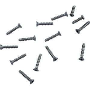 Scattered silver screws on white background.