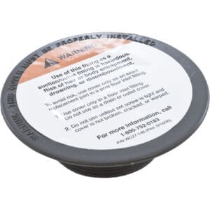 Round warning label with safety instructions.