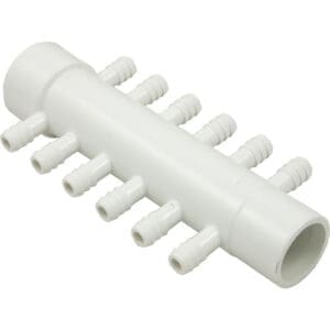 White plastic manifold with multiple barbed connectors.