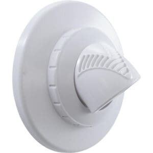 White round electrical switch on wall.