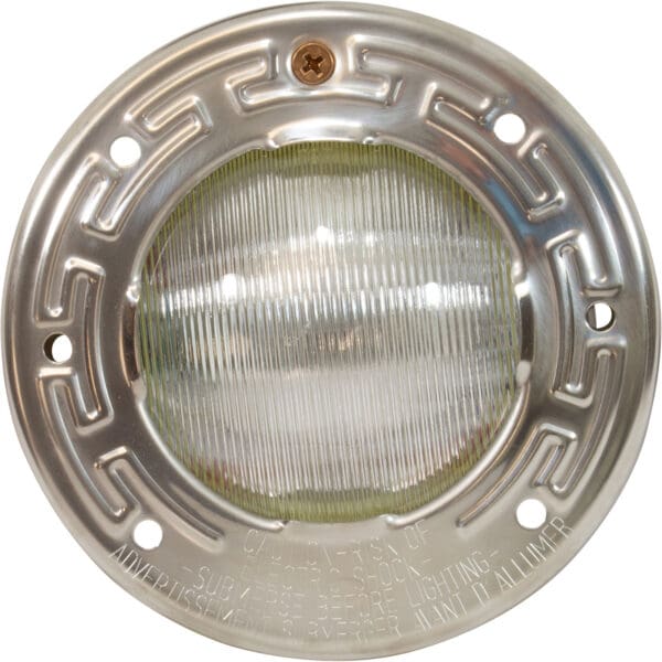 Round metallic fixture with glass cover.
