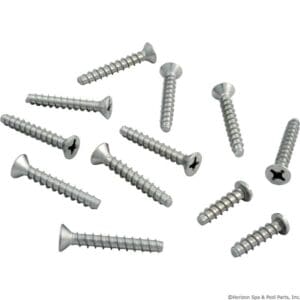 Metal screws scattered on a white background.