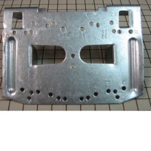 Metal bracket on grid background.