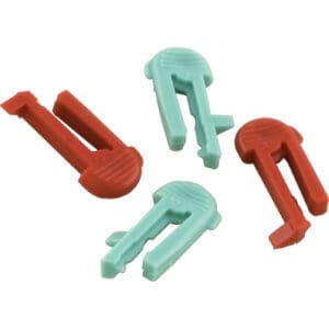 Four plastic game pieces, red and teal.