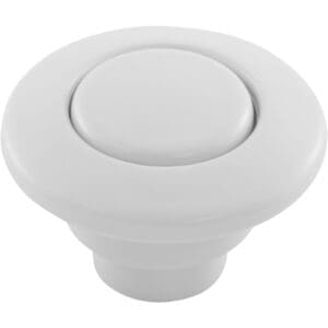 White push button for garbage disposal.
