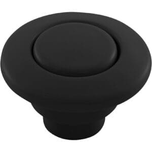 Black round push-button garbage disposal switch.