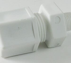 White plastic threaded pipe fitting connector.