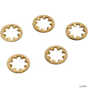 Five brass star lock washers scattered.