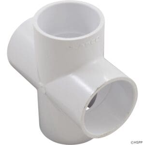 White PVC pipe cross fitting connector.