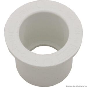 White PVC pipe fitting, close-up view.