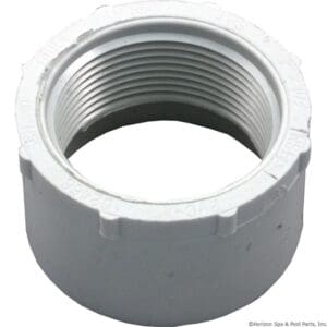 White threaded PVC pipe fitting adapter.