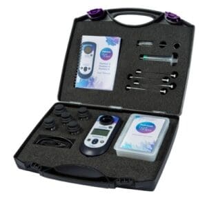 Testing kit with various tools and manual.